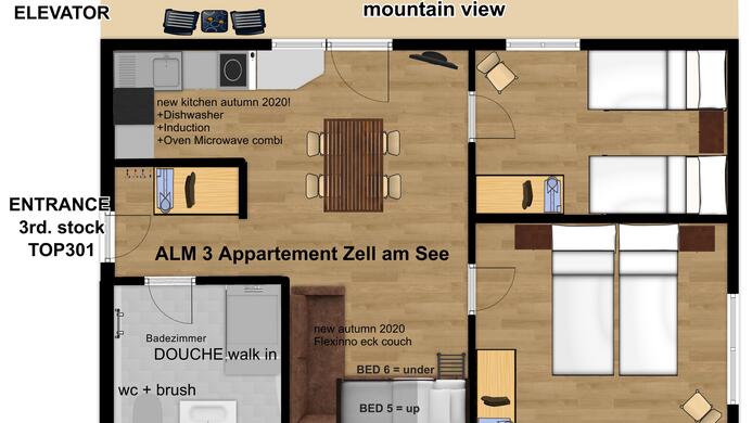 A floor plan of an apartment with two bedrooms, a kitchen, and a dining area. The balcony offers a view of the mountains.